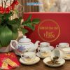Bộ bình trà men trắng vẽ hoa sen vàng kim