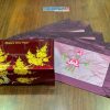 Bộ quà tặng hộp sơn mài hoa mai và bộ khăn trải bàn màu tím thêu sen