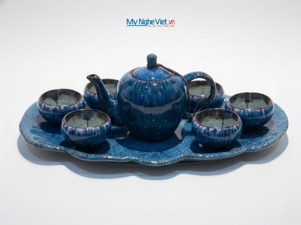 Bộ bình trà dáng đà điểu quai sứ men hỏa biến xanh lòng khay xếp