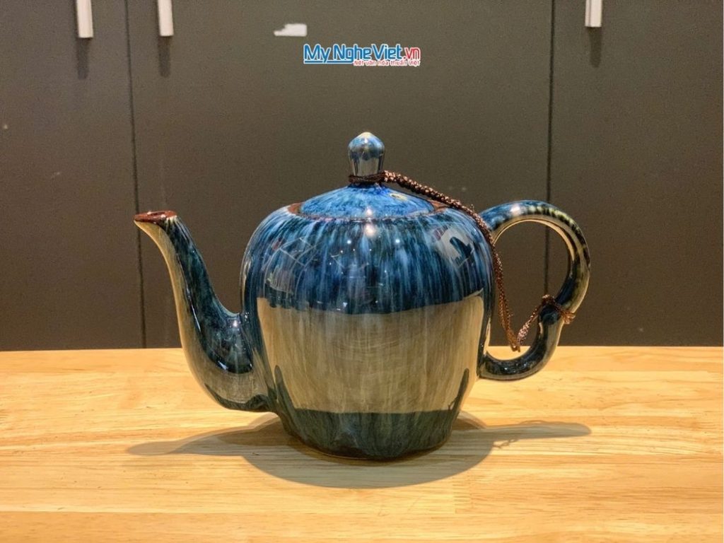Bộ bình trà dáng đà điểu quai sứ men hỏa biến xanh lòng khay xếp