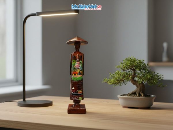 Tượng cô gái miss áo dài vẽ đồng quê