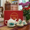 Bộ bình trà men trắng vẽ vàng kim hoa sen